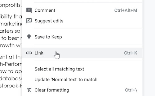 A cursor hovers over the Link option within the Insert drop-down menu.
